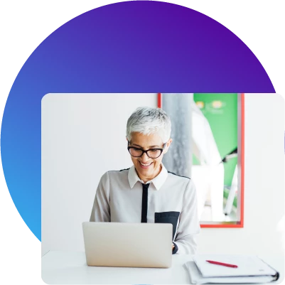 Woman using her computer at home to manage her finances